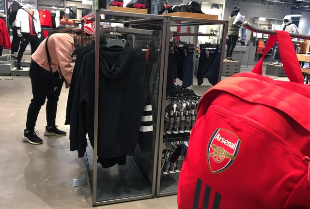 A backpack with a logo of English soccer club Arsenal is seen at an Adidas store in Beijing, China December 16, 2019. REUTERS/Jason Lee