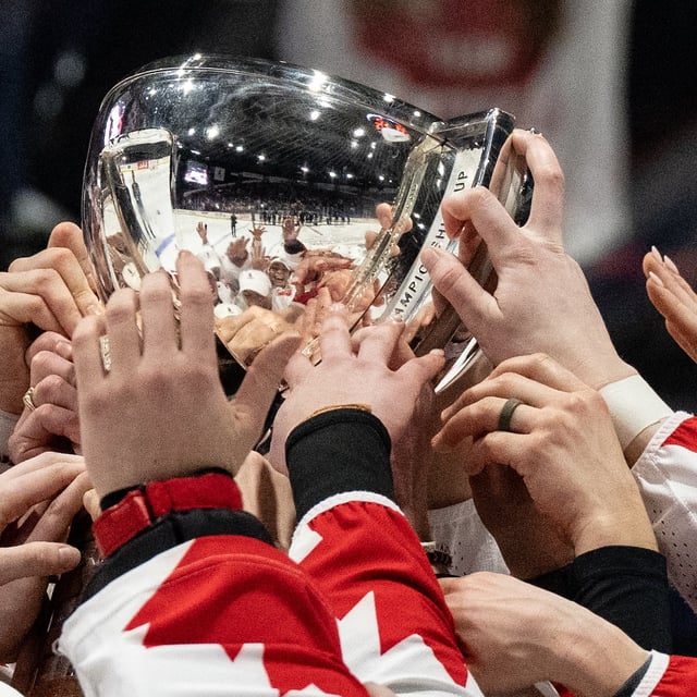 Canada players celebrate their gold medal win over United States at the IIHF Women's World Hockey Championship in Utica, N.Y., Sunday, April 14, 2024. THE CANADIAN PRESS/Christinne Muschi