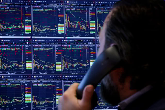 A trader works on the floor at the New York Stock Exchange in New York City, U.S., April 8, 2025.  REUTERS/Brendan McDermid/File Photo