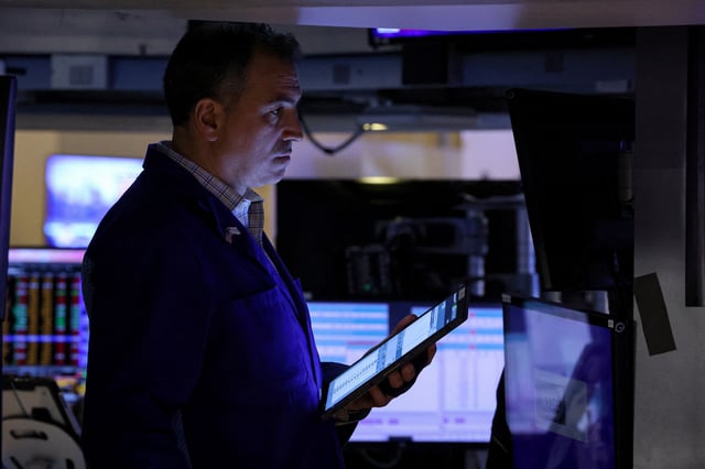 A trader works on the floor at the New York Stock Exchange (NYSE) in New York City, U.S., April 8, 2025.  REUTERS/Brendan McDermid