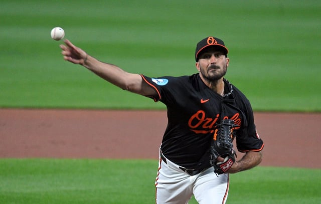 April 02, 2025: Orioles starter Zach Eflin pitches against the Red Sox in the first inning at Oriole Park at Camden Yards. (Kenneth K. Lam/Staff)