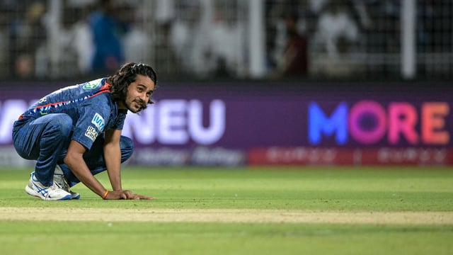 Lucknow Super Giants' Digvesh Rathi celebrates after taking the wicket of Kolkata Knight Riders' Sunil Narine during the Indian Premier League (IPL) Twenty20 cricket match between Kolkata Knight Riders and Lucknow Super Giants at the Eden Gardens