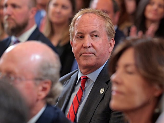 WASHINGTON, DC - MARCH 20: Texas Attorney General Ken Paxton attends the executive order signing ceremony to reduce the size and scope of the Education Department in the East Room of the White House on March 20, 2025 in Washington, DC. The order instructs Education Secretary Linda McMahon, former head of the Small Business Administration and co-founder of the World Wrestling Entertainment, to shrink the $100 billion department, which cannot be dissolved without Congressional approval. (Photo by Chip Somodevilla/Getty Images)