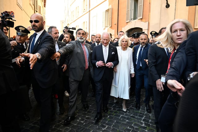 Britain's King Charles III and Queen Camilla walk back to their car after departing the Italian Parliament, in Rome, Italy, 09 Apr 2025. Victoria Jones/Pool via REUTERS