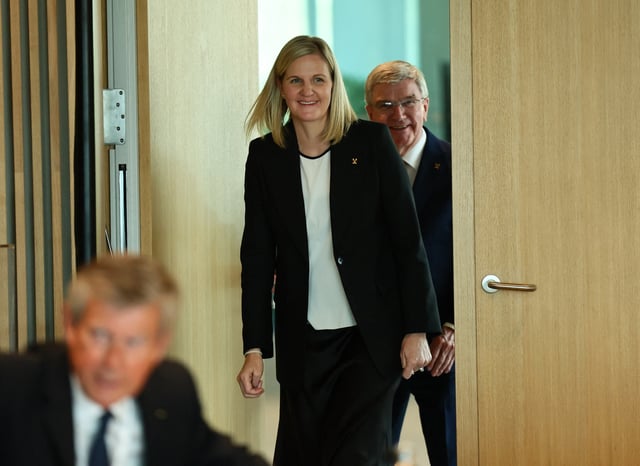 Olympics - IOC Executive Board Meeting - Photo Opp - Olympic House, Lausanne, Switzerland - April 9, 2025 New International Olympic Committee (IOC) president-elect Kirsty Coventry with former president Thomas Bach REUTERS/Denis Balibouse