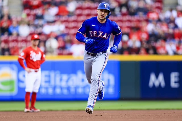 Apr 1, 2025; Cincinnati, Ohio, USA; Texas Rangers outfielder Wyatt Langford (36) runs the bases after hitting a solo home run in the first inning against the Cincinnati Reds at Great American Ball Park. Mandatory Credit: Katie Stratman-Imagn Images/File Photo