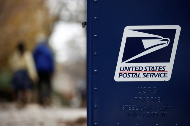 A United States Postal Service (USPS) collection box is pictured in Washington, U.S., December 18, 2024. REUTERS/Benoit Tessier/File Photo
