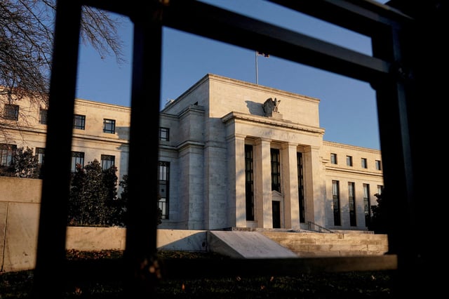The Federal Reserve building is seen before the Federal Reserve board is expected to signal plans to raise interest rates in March as it focuses on fighting inflation in Washington, U.S., January 26, 2022. REUTERS/Joshua Roberts/File Photo