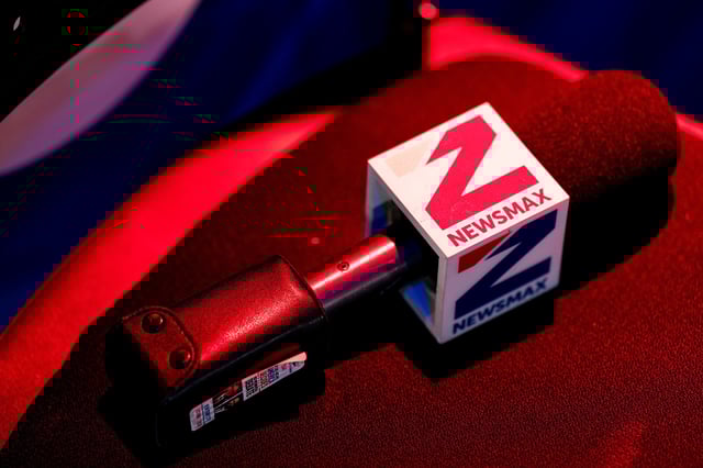 A Newsmax microphone in the spin room ahead of the first vice presidential debate at the CBS Broadcast Center in New York, US, on Tuesday, Oct. 1, 2024.