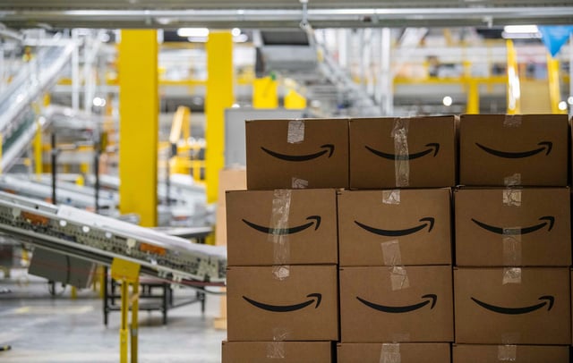 Packing boxes at the Amazon Warehouse in Mt. Juliet, Tenn., Thursday, June 10, 2021.