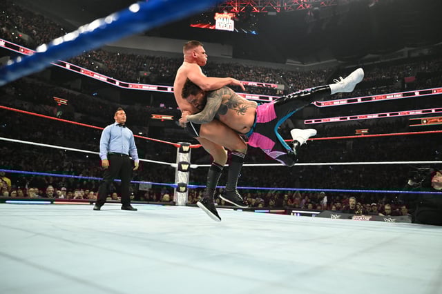 SAN ANTONIO, TEXAS - JANUARY 25: Jey Uso spears Gunther during Saturday Night&#39;s Main Event at Frost Bank Center on January 25, 2025 in San Antonio, Texas.