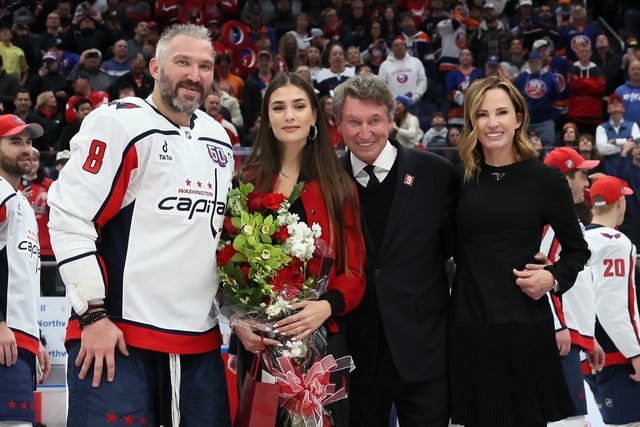 Alex Ovechkin, his wife Anastasia Shubskaya, former NHL great Wayne Gretzky, and Gretsky&#39;s wife, Janet Jones, celebrate Avi&#39;s 895 career goal on April 06, 2025.