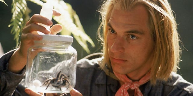 Julian Sands holds a spider in a container in 'Arachnophobia'