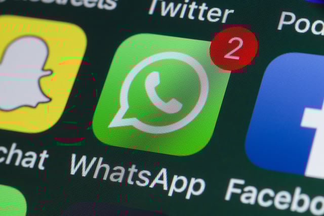 Stock image. The buttons of WhatsApp, Facebook, Twitter and other apps on the screen of an iPhone.