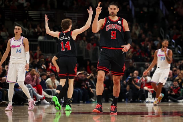 Chicago Bulls center Nikola Vucevic (9) celebrates after scoring a 3-pointer during the second half of a game against the Miami Heat at the United Center on Wednesday, April 9, 2025, in Chicago. (Audrey Richardson/Chicago Tribune)