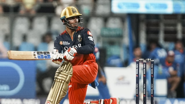 Jitesh Sharma plays a shot against Mumbai Indians