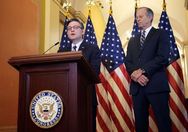 US Speaker of the House Mike Johnson (R-LA) (L) and Senate Majority Leader John Thune (R-SD) speak at a press conference on the Republican budget bill at the US Capitol on April 10, 2025.
