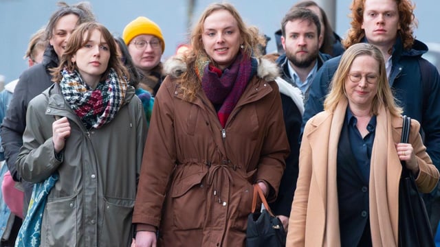 Beth Upton, centre, arriving at the tribunal with supporters