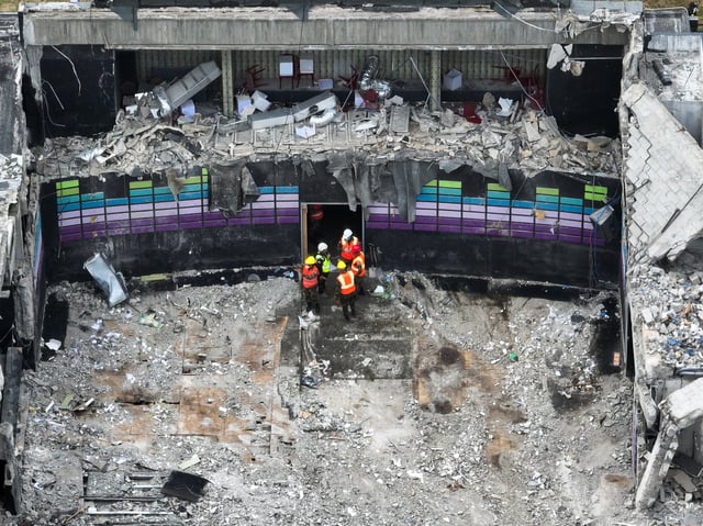 A drone view shows emergency personnel at the site of the collapsed Jet Set nightclub, in Santo Domingo, Dominican Republic, April 10, 2025. REUTERS/Ricardo Arduengo