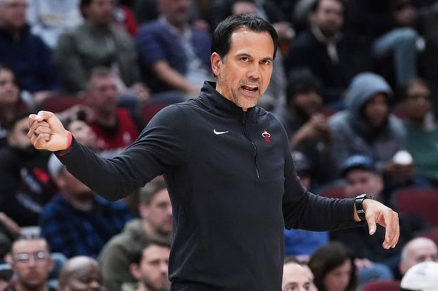 Heat coach Erik Spoelstra reacts as he watches players during the second half of an NBA basketball game against the Chicago Bulls in Chicago, Wednesday, April 9, 2025. (AP Photo/Nam Y. Huh)