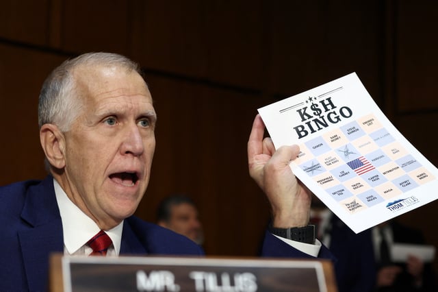 U.S. Sen. Thom Tillis (R-NC) speaks holding a "bingo card" as Kash Patel, U.S. President Donald Trump's nominee to be director of the FBI, testifies before a Senate Judiciary Committee confirmation hearing on Capitol Hill in Washington, U.S., January 30, 2025. REUTERS/Evelyn Hockstein