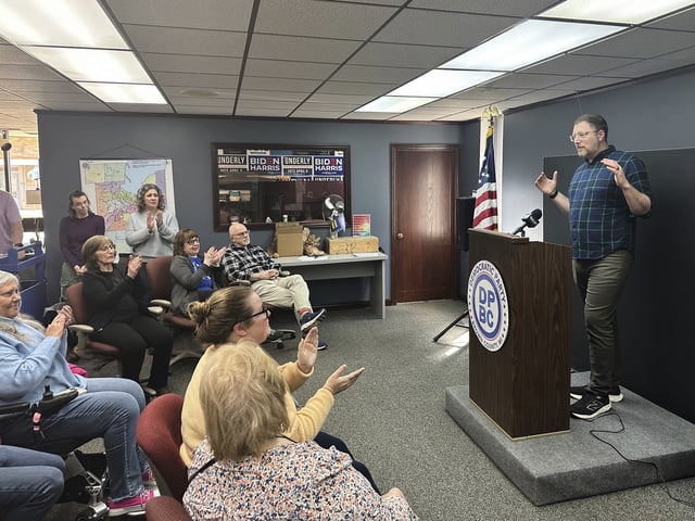 Wisconsin Democratic Party Chairman Ben Wikler talks to democratic party volunteers, Monday, March 31, 2025, in Green Bay, Wis., before they begin a last-day neighborhood canvass ahead of Tuesday's state Supreme Court election. (AP Photo/Tom Beaumont)