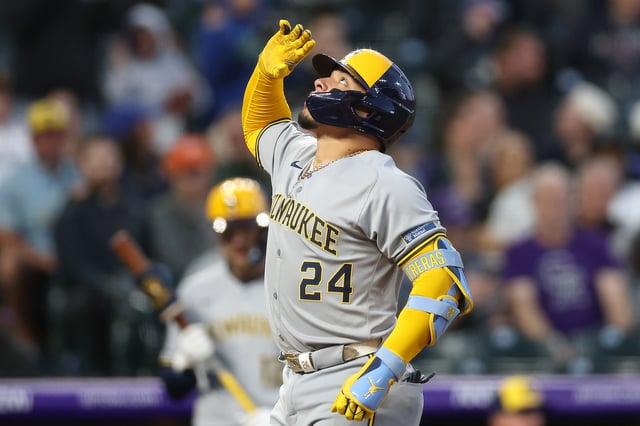 DENVER, COLORADO - APRIL 09: William Contreras #24 of the Milwaukee Brewers gestures as he crosses home plate after hitting a 2 RBI home run against the Colorado Rockies in the third inning at Coors Field on April 09, 2025 in Denver, Colorado.