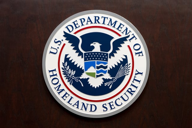 The Department of Homeland Security seal is seen on the podium at the Immigration and Customs Enforcement headquarters, Wednesday, April 9, 2025, in Washington. (AP Photo/Alex Brandon)