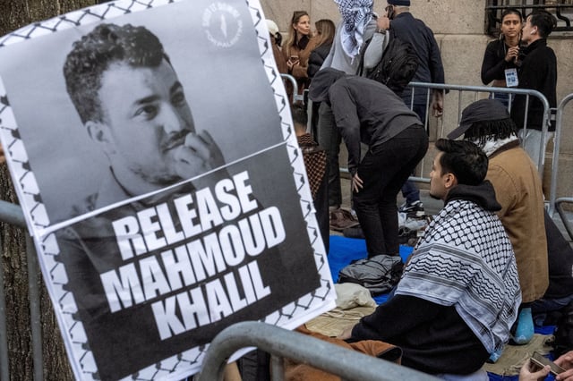 Muslim protestors pray outside the main campus of Columbia University during a demonstration to denounce the immigration arrest of Mahmoud Khalil, a pro-Palestinian activist who helped lead protests against Israel at the university, in New York City, U.S., March 14, 2025. REUTERS/David Dee Delgado/File Photo