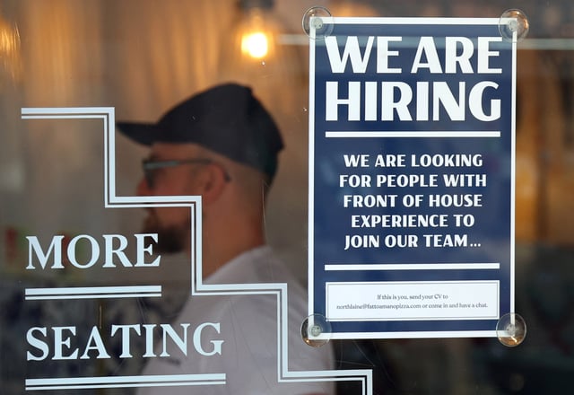 A restaurant advertises for workers in Brighton, Britain, August 15, 2023. REUTERS/Toby Melville/File Photo