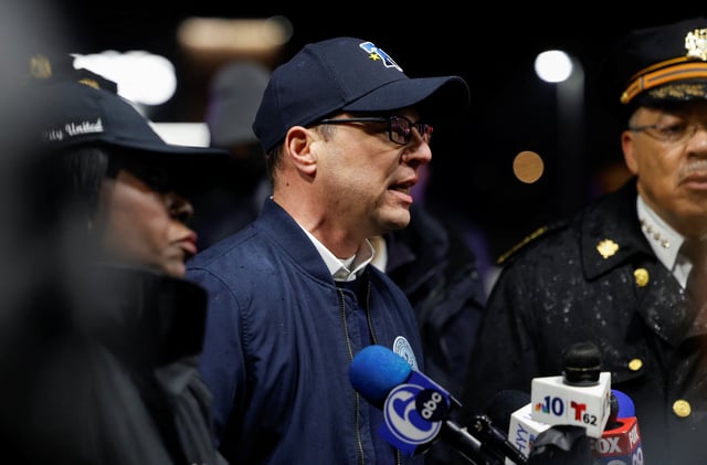 Pennsylvania Governor Josh Shapiro speaks to the press, as Philadelphia Mayor Cherelle Parker listens, at the site of a plane crash in Philadelphia, Pennsylvania, U.S., January 31, 2025. REUTERS/Rachel Wisniewski