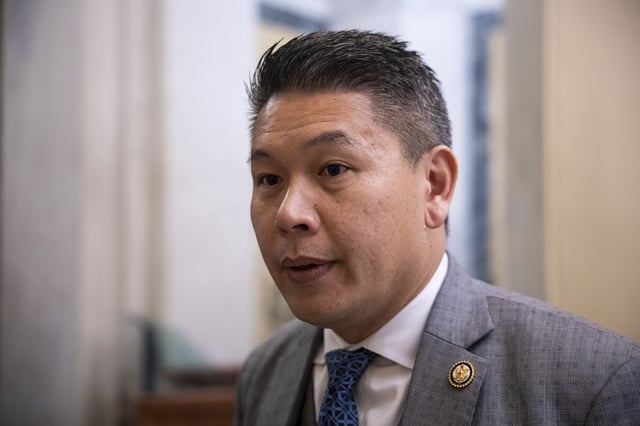 Rep. Derek Tran (D-Calif.) speaks with a reporter as he arrives for a vote at the U.S. Capitol Feb. 26, 2025.