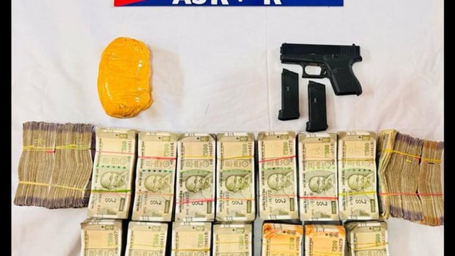 Three accused were arrested and 500 gm heroin, a Glock 9 mm pistol with two magazines and ₹33 lakh seized.