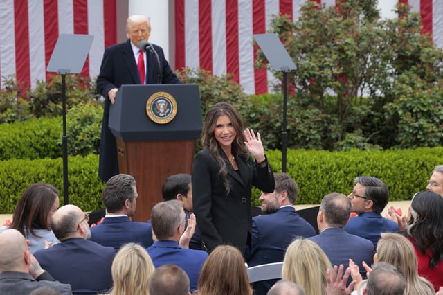 Department of Homeland Security Secretary Kristi Noem (C) is recognized as President Donald Trump is seen speaking during a “Make America Wealthy Again” trade announcement event in the Rose Garden at the White House on April 2, 2025, in Washington, D.C. (Photo by Chip Somodevilla/Getty Images)
