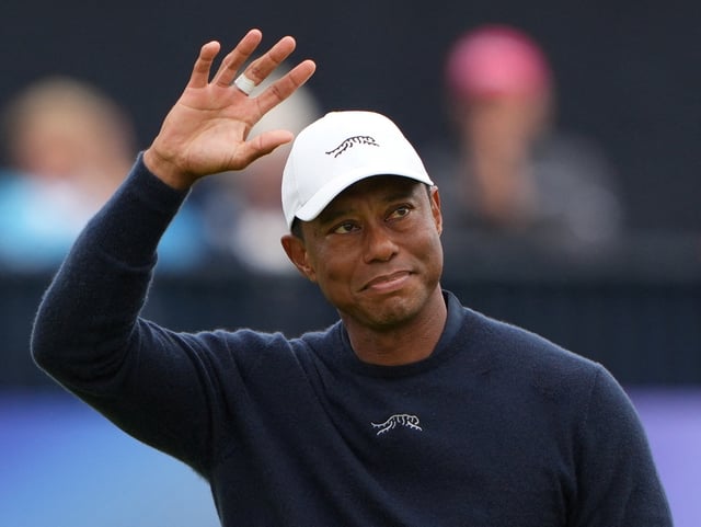 Golf - The 152nd Open Championship - Royal Troon Golf Club, Troon, Scotland, Britain - July 19, 2024 Tiger Woods of the U.S. acknowledges the crowd at the 18th green after finishing his second round REUTERS/Maja Smiejkowska/File Photo