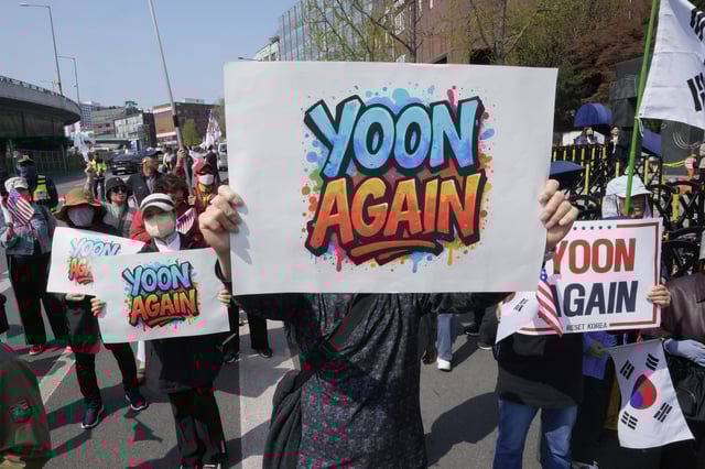 Supporters of recently ousted South Korean President Yoon Suk Yeol attend a rally to oppose his impeachment near the presidential residence in Seoul, South Korea, Friday, April 11, 2025. (AP Photo/Ahn Young-joon)