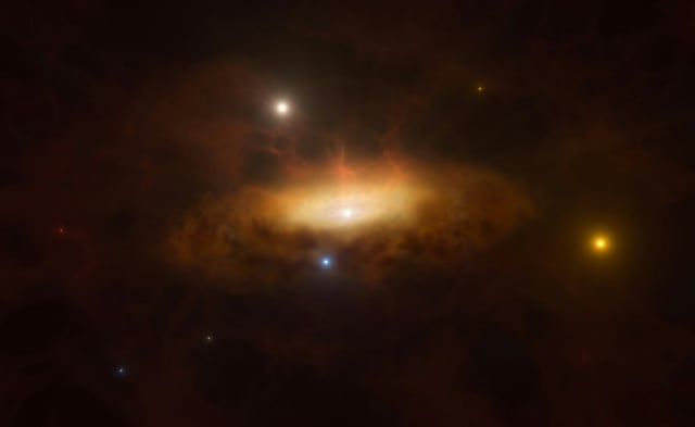 Strange blasts from this galaxy's heart suggests a black hole is emerging from slumber
