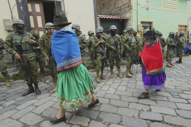 Indigenous people arrive at a rally for presidential candidate Luisa Gonzalez in Tixan, Ecuador, Sunday, March 30, 2025. (AP Photo/Dolores Ochoa)