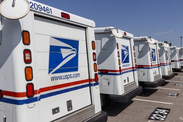 Stock image/file photo: Parked USPS vans in Indianapolis, 2019.