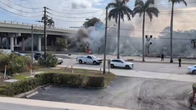 Authorities are present at the scene as the small plane crashed near a major highway in South Florida. 