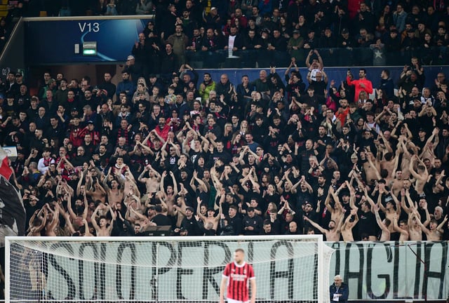 Soccer Football - Serie A - Udinese v AC Milan - Bluenergy Stadium, Udine, Italy - April 11, 2025 AC Milan fans in the stands during the match REUTERS/Daniele Mascolo
