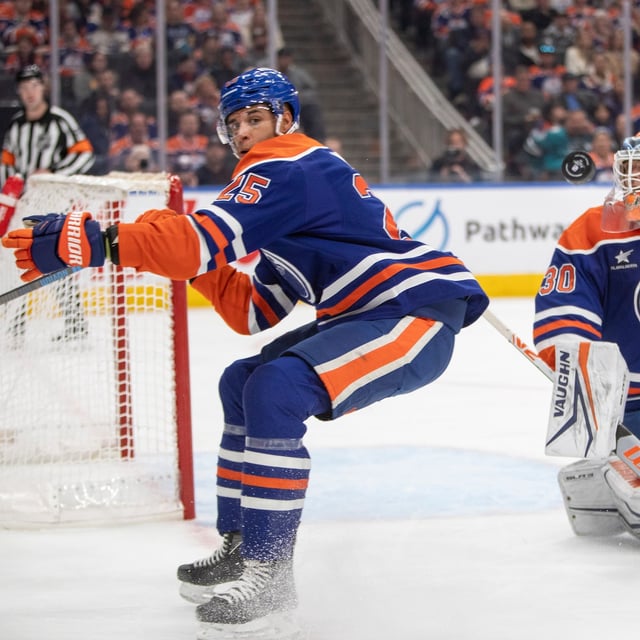 Edmonton Oilers' Darnell Nurse (25) looks for the rebound  from goalie Calvin Pickard (30) during first period NHL action against the San Jose Sharks'  in Edmonton on Friday, April 11, 2025. THE CANADIAN PRESS/Amber Bracken