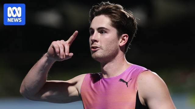 Rohan Browning celebrates winning 100m final at national championships.