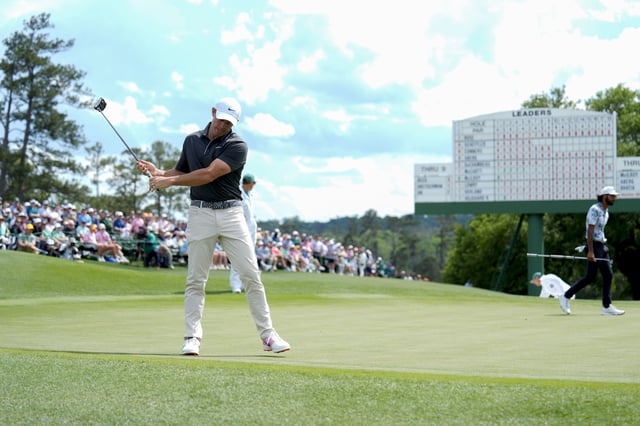 Apr 11, 2025; Augusta, Georgia, USA; Rory McIlroy reacts after missing a putt on no. 18 during the second round of the Masters Tournament at Augusta National Golf Club. Mandatory Credit: Katie Goodale-Imagn Images