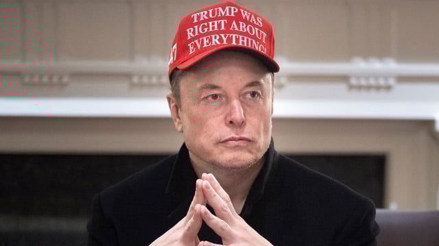 Elon Musk looks on during a Cabinet Meeting in the Cabinet Room of the White House March 24, 2025 in Washington, D.C.