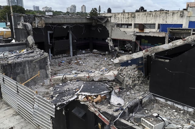 A view of the Jet Set nightclub days after its roof collapsed, killing more than 200 people, in Santo Domingo, Dominican Republic, Friday, April 11, 2025. (AP Photo/Matias Delacroix)