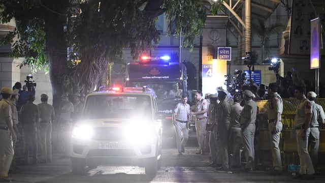 A cavalcade escorting Tahawwur Hussain Rana leaves the Patiala House Court, in New Delhi on Friday. 