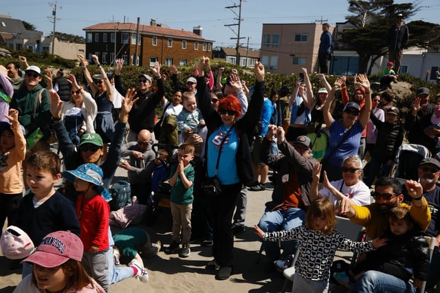 A crowd dances Saturday during the grand opening of the Sunset Dunes park along the former Upper Great Highway in San Francisco.