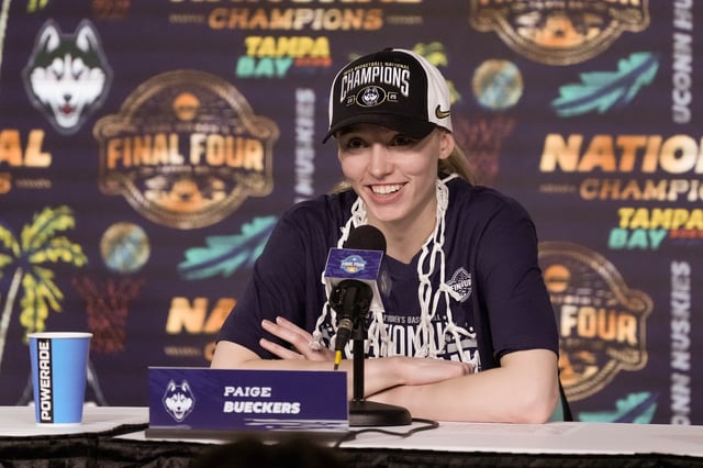 Apr 6, 2025; Tampa, FL, USA; Connecticut Huskies guard Paige Bueckers (5) speaks to the media after the national championship of the women's 2025 NCAA tournament against the South Carolina Gamecocks at Amalie Arena. Mandatory Credit: Kirby Lee-Imagn Images/File Photo