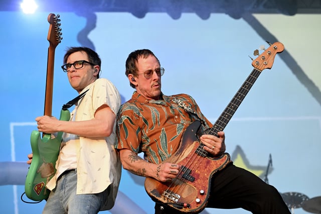 Rivers Cuomo and Scott Shriner of the band Weezer perform during the 2023 Railbird Music Festival in Lexington, Ky.